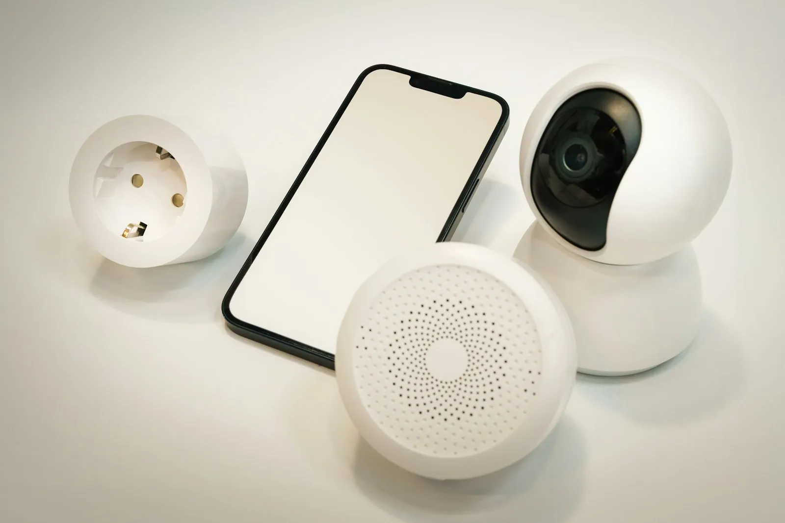 Smartphone and camera on a table